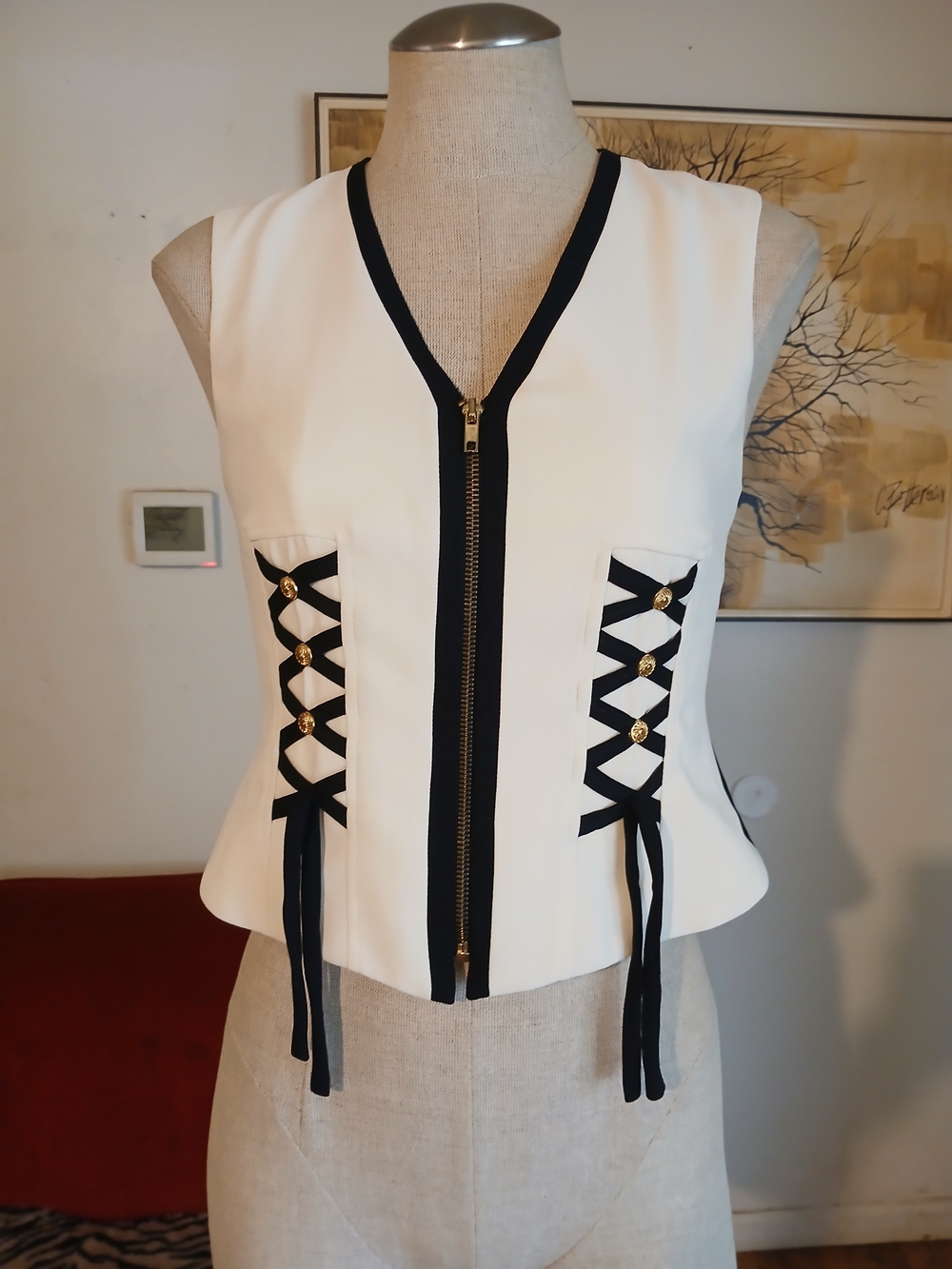 Vintage Rina Rossi White Sleeveless Zip-Front Peplum Top with Black Trim